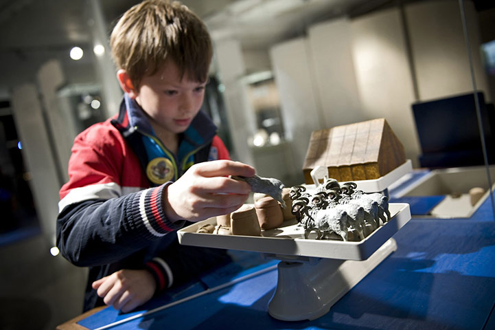 New museums: A boy plays with an interactive at the Tullie House Museum 