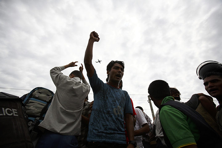 24 hours in pictures: Former Maoist fighters in Kathmandu