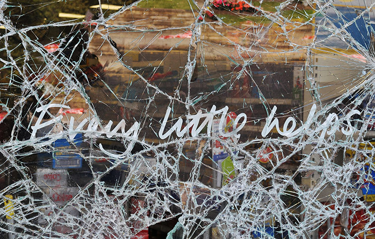 London Riots: The smashed windows of a Tesco supermarket