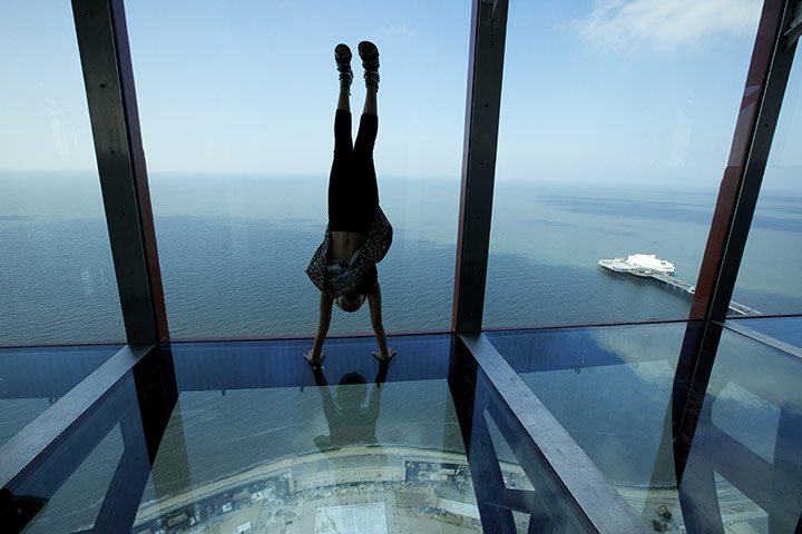 Blackpool Tower: Jessica Hill, 8, doing a handstand on the skywalk