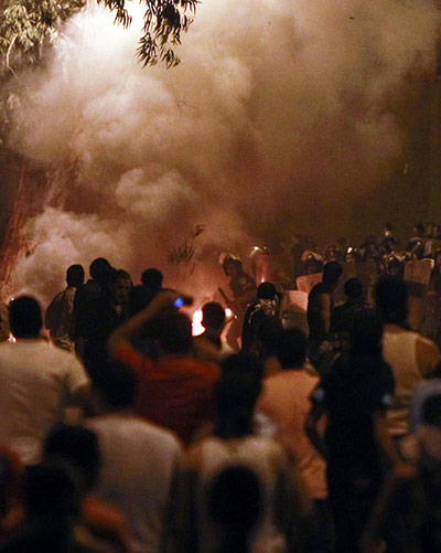 Egypt Riots: Egyptians protesters clash with riot police at the Israeli embassy in Cairo