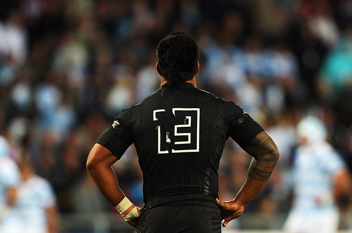 Argentina v England : Manu Tuilagi has a breather during the hard fought first half 