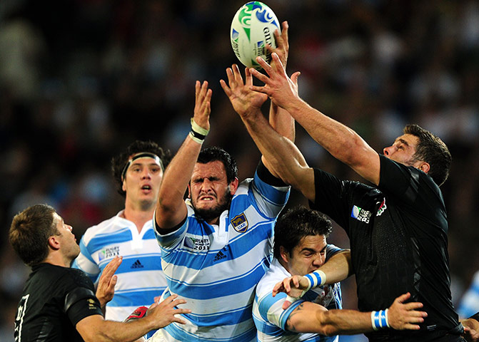 Argentina v England : Juan Figallo fights for the ball with Nick Easter