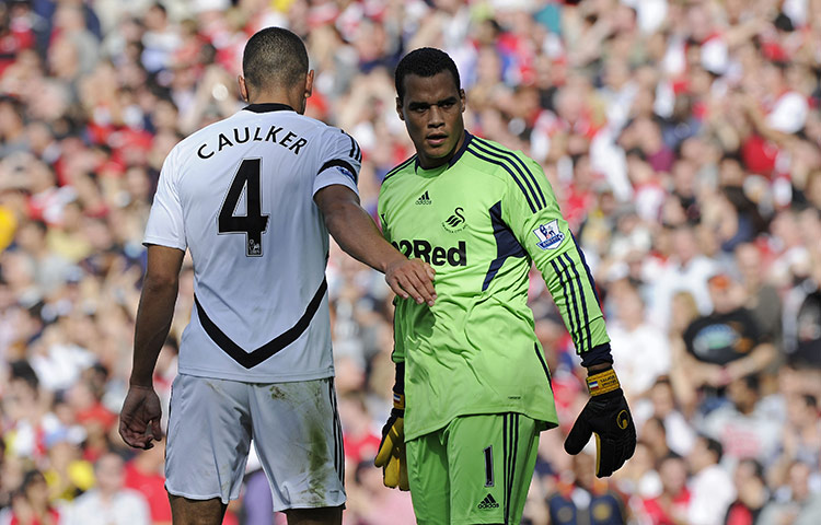 Arsenal v Swansea: Swansea's Steven Caulker commiserates with his keeper Michael Vorm 
