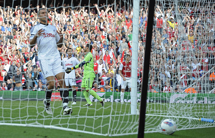 Arsenal v Swansea: Arsenal's Andrey Arshavin scores courtesy of an error by the Swansea keeper