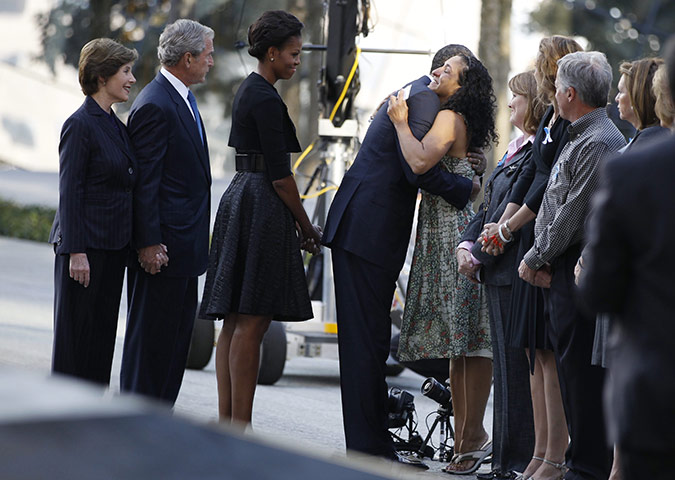 9/11 anniversary: Obama embraces a victim's relative