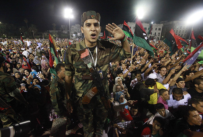 Tripoli celebration rally: An anti-Gaddafi fighter attends the celebration rally