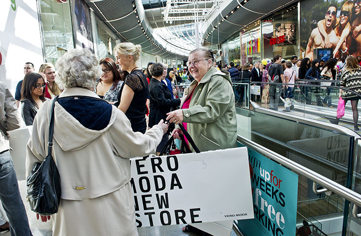 Westfield Stratford: Shoppers with promotional bags