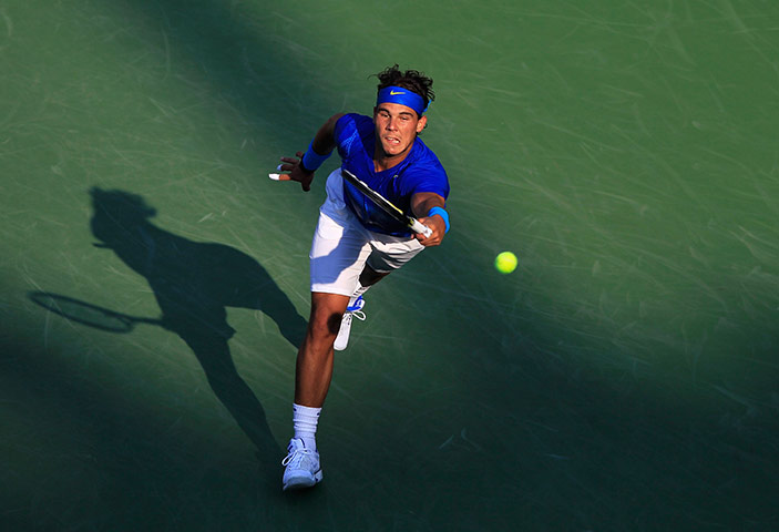 US Open final: Rafael Nadalreaches for a return against Novak Djokovic