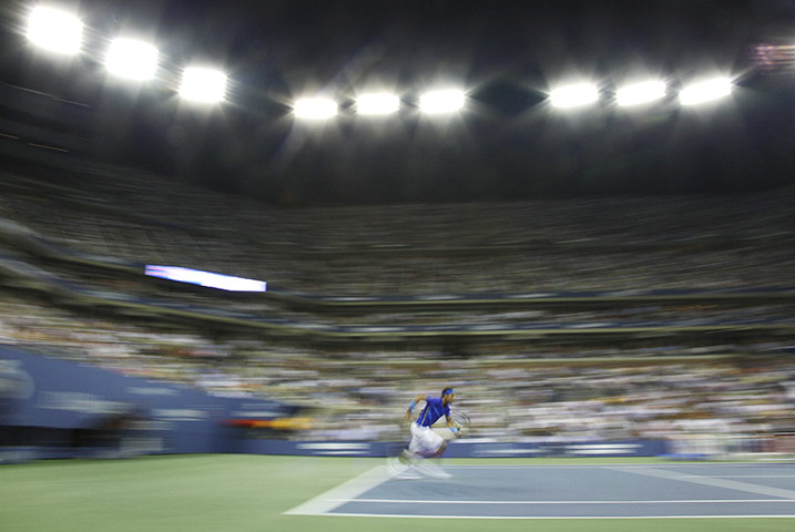 US Open final: Rafael Nadal races to the ball in order to return a shot to Novak Djokovic