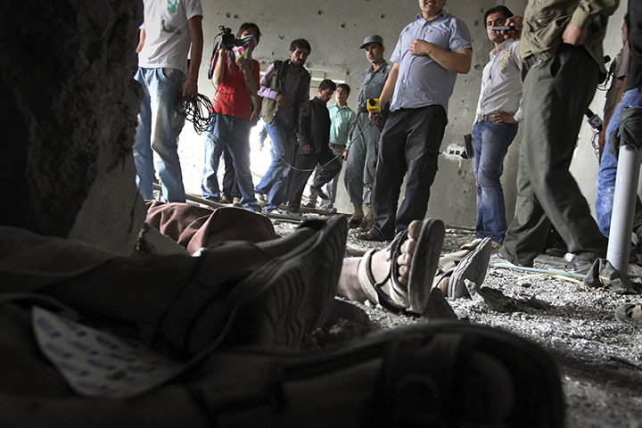 kabul seige: Security forces and the media examine the bodies