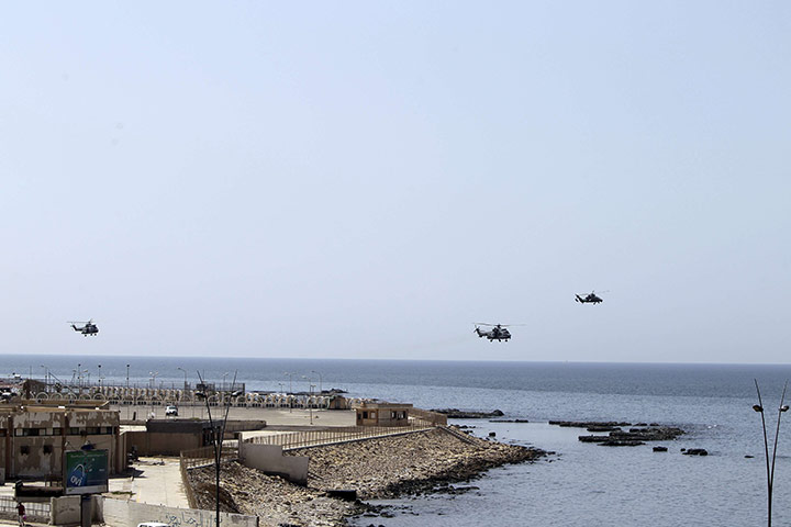 Cameron in Tripoli: NATO military helicopters carry President Sarkozy and David Cameron 