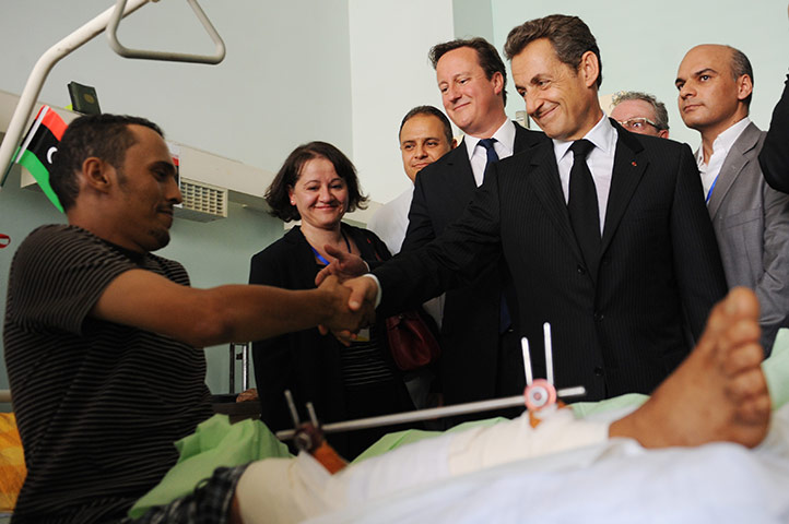 Cameron in Tripoli: David Cameron and Nicolas Sarkozy visit Tripoli Medical Centre