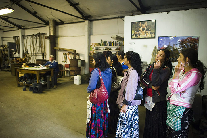 FTA: Attila Balazs: Day-workers listen to the morning briefing by farm-owner Bela Szakacs 