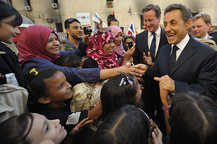 Cameron in Libya: Nicolas Sarkozy and Cameron with people in the crowd in Benghazi 