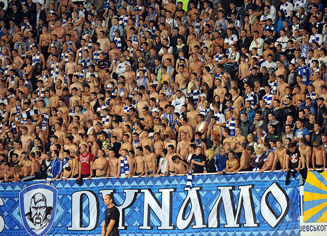 Europa League: Bare chested Dynamo Kiev fans watch the Europa League match against Stoke