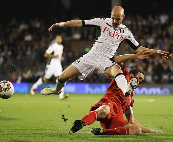 Europa League: Fulham's Andy Johnson avoids a challenge from FC Twente's Peter Wisgerhof