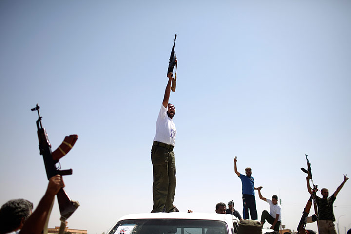 24 hours in pictures: Former rebel fighters celebrate in Bani Walid, Libya