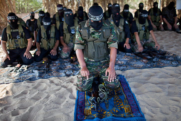 24 hours in pictures: Palestinian militants from the Al Nasser Brigades, Gaza strip
