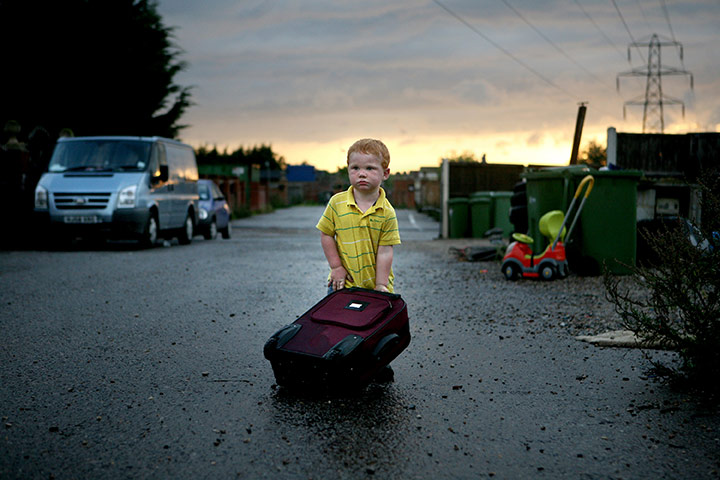 Dale Farm: Dennis Sheridan with his suitcase outside his yard at Dale Farm