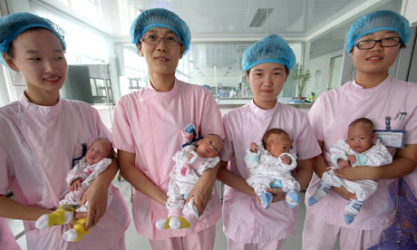 Chinese nurses with quadruplets