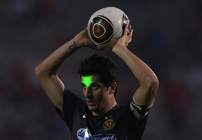24 Hours: A laser beam on the face of Aymen Ben Amor of Tunisia's Esperance Sportive