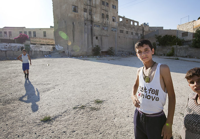 Levene West Bank: Boys hang out in Hebron Old City