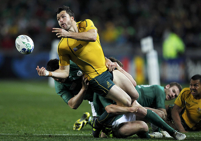 Australia v Ireland: Australia's Adam Ashley-Cooper off loads the ball before taking a hit