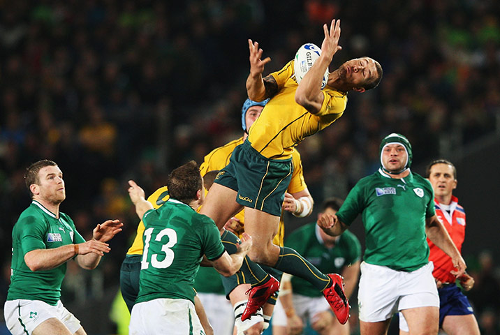 Australia v Ireland: Australia's Quade Cooper jumps for a high ball, but fails to make the catch