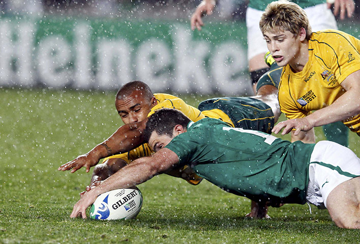 Australia v Ireland: Ireland's Rob Kearney gets to the ball before Will Genia