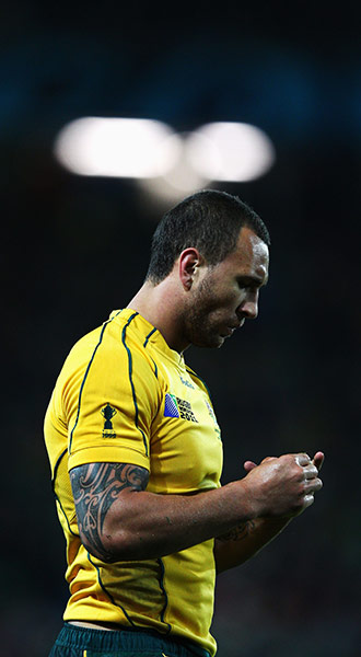 Australia v Ireland: A dejected Quade Cooper walks off the pitch at the end of the match
