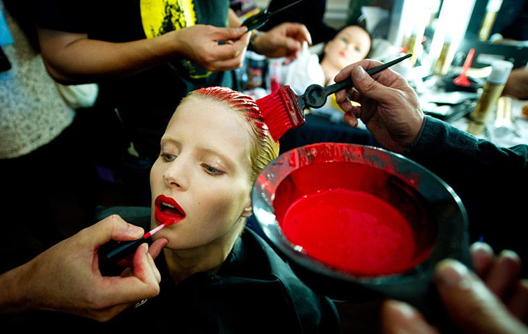 24 hours: London, England: A model prepares before the Julien Macdonald show