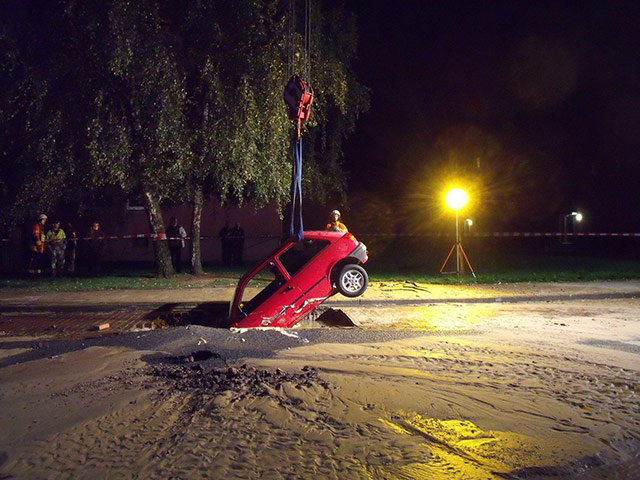 24 hours: Braunschweig, Germany: A parked car which sank after a pipe burst