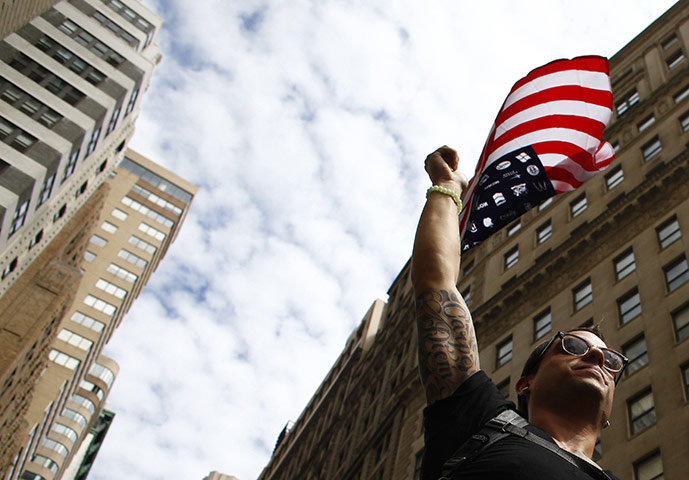 24 hours: New York City, New York, USA: A protester demonstrates against banks