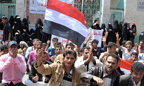 Yemeni protesters rally outside of Sanaa University (Photo courtesy of The Guardian).