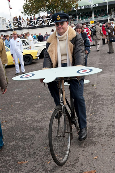 Goodwood Revival: uniformed chap on bike