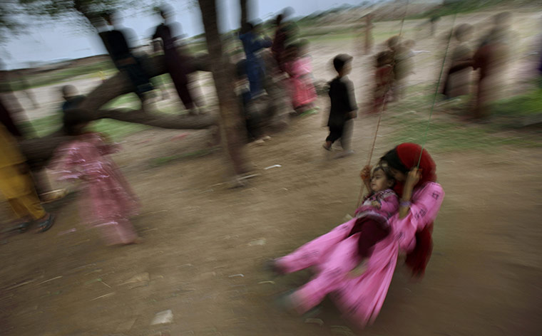 24 hours in pictures: Eid al-Fitr 