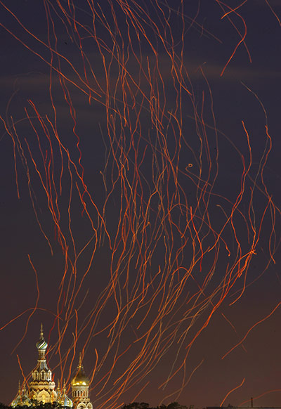 24 hours in pictures: Trails from paper lanterns illuminate the sky over St.Petersburg