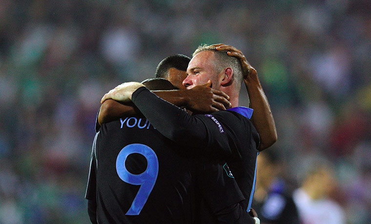 Bulgaria v England: Theo Walcott, Wayne Rooney and Ashley Young celebrate after Rooney scores