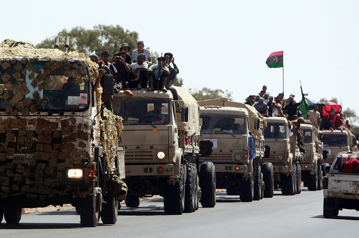Libya fighting continues: Anti-Gaddafi fighters prepare to fight on the outskirts of Herawa