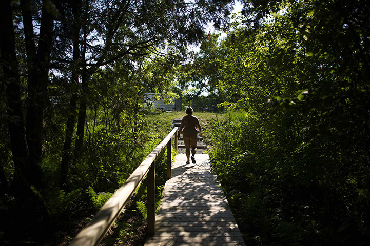 FTA: Mark Blinch: Park manager Karen Grant walks through the park