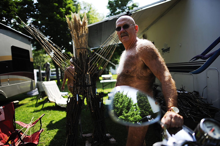 FTA: Mark Blinch: A man leans on his motorcycle