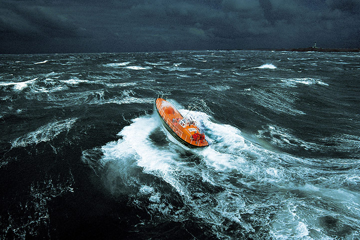The Sea: A lifeboat in a storm off Ile d'Ouessant, Brittany, France