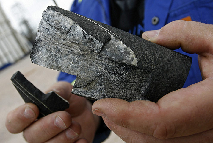 Week in Business: An employee holds a segment of Bowland Shale
