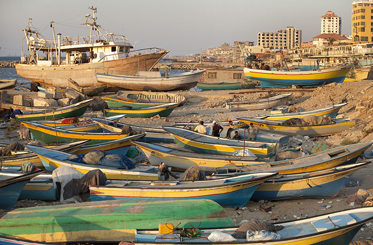 Palestinian Lives: Fishermen with their boats at the Gaza City Wharf area