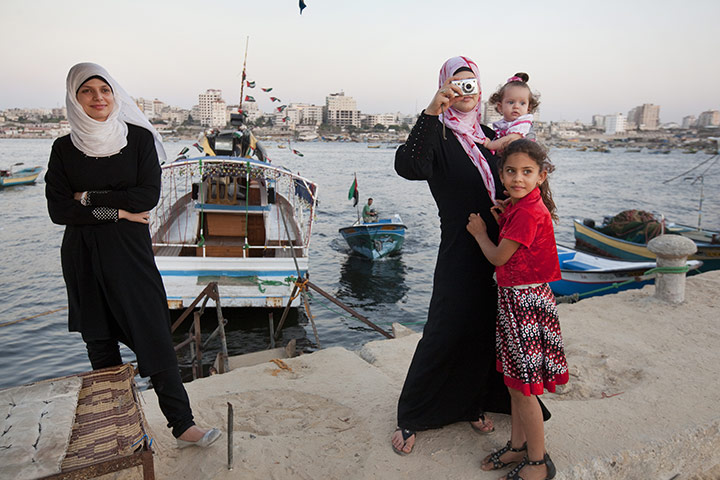 Palestinian Lives: A family enjoy a day at the beach in Gaza