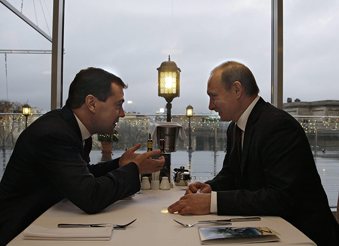 Medvedev and Putin: Medvedev with Vladimir Putin at a restaurant in St Petersburg