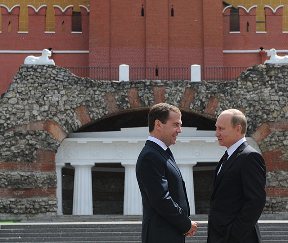 Medvedev and Putin: Medvedev and Vladimir Putin speak after a wreath laying ceremony 