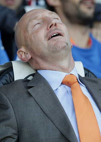Pix of the week: Blackpool manager Ian Holloway looks to be asleep at the game at Portsmouth