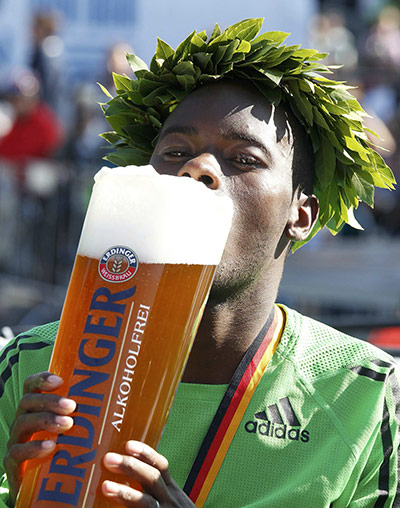 Pix of the week: Patrick Makau celebrates victory in the Berlin Marathon